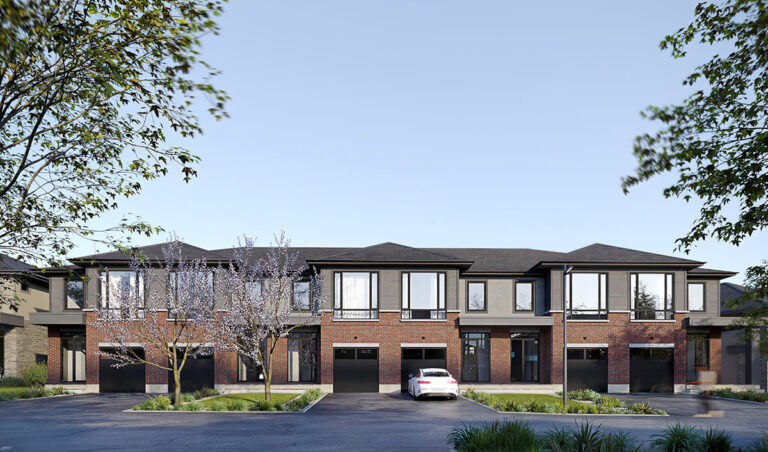 Front view of a red brick Klondike Ridge townhome