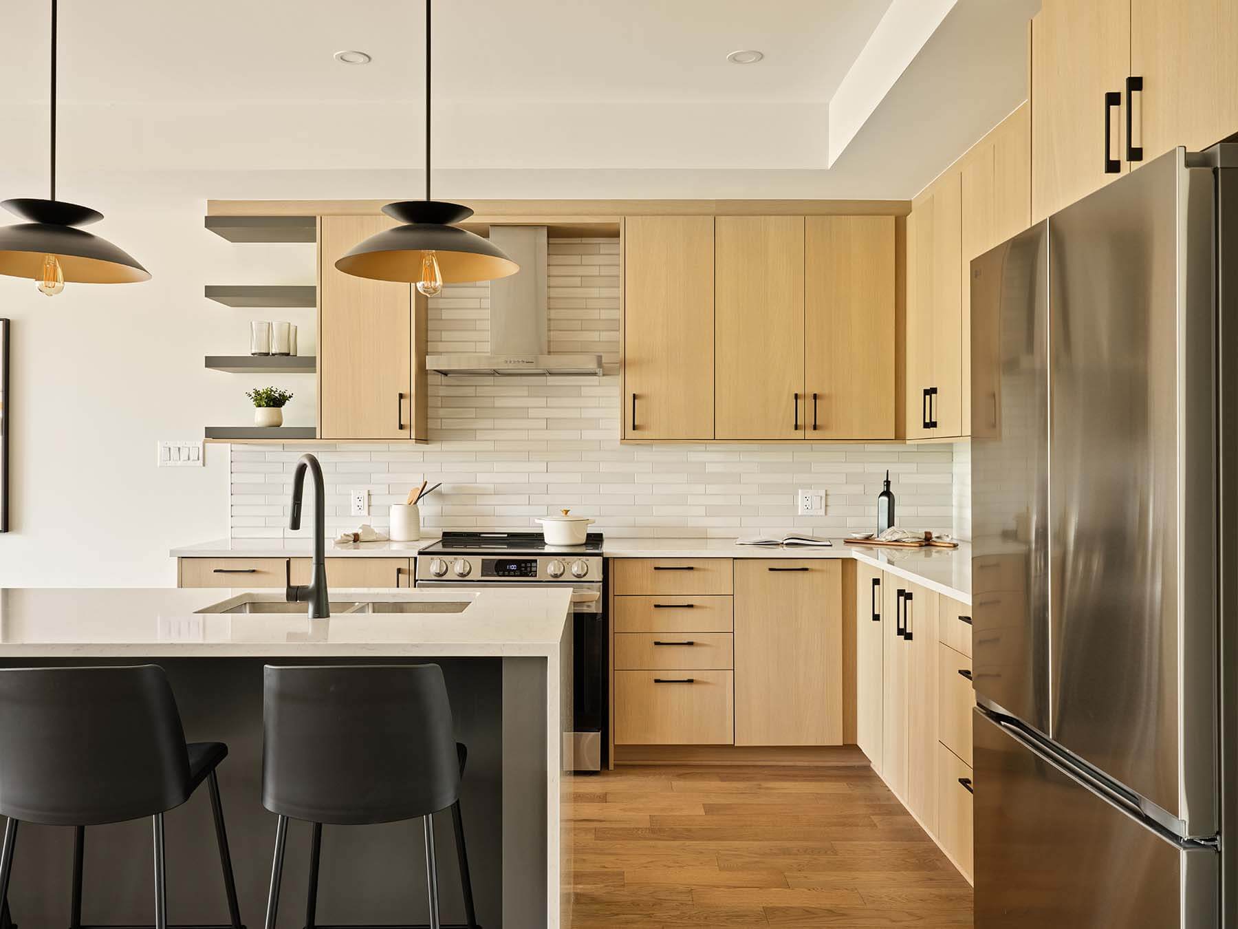 Kitchen island, cabinetry and stainless steel appliances