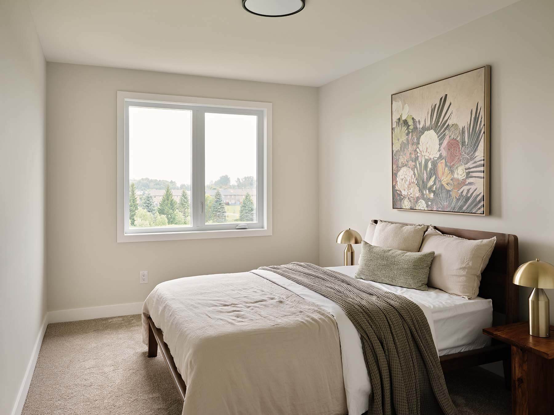 Bedroom with upholstered bed and neighbourhood view