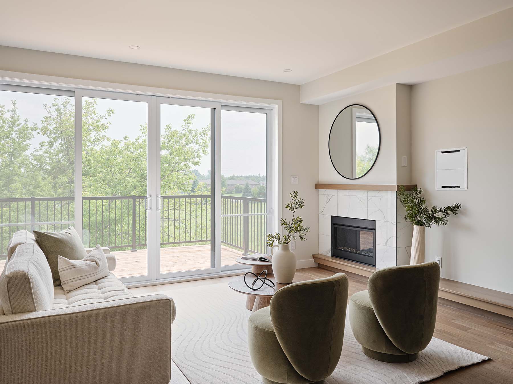 Living room with fireplace and large patio doors