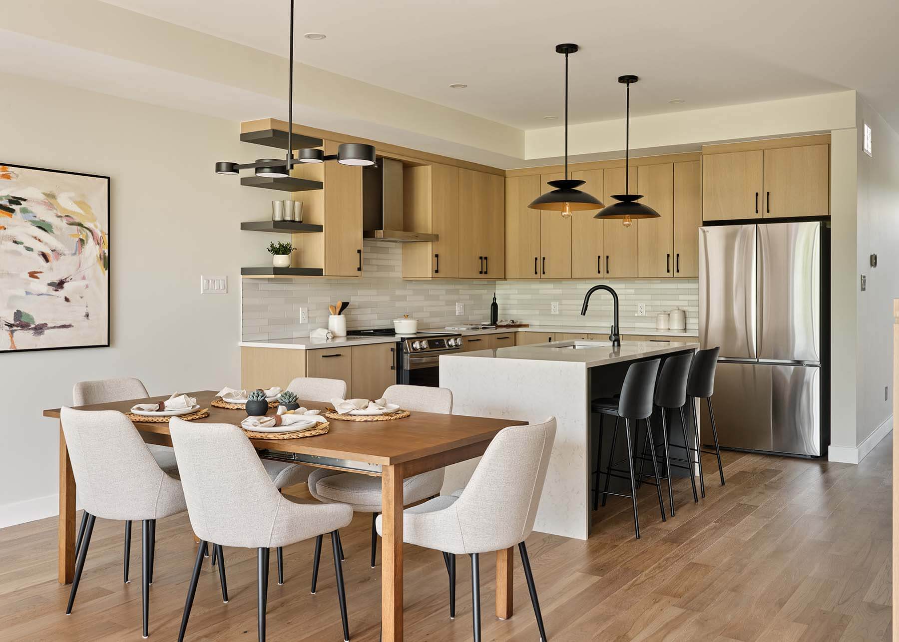 Dining table beside the modern kitchen island